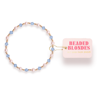 Gold, light blue, and Pearl beaded bracelet. 