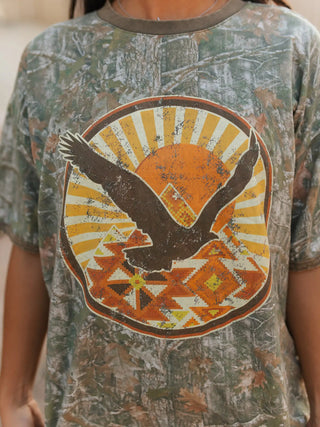 camouflage t-shirt with a graphic design of an eagle and sun.