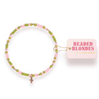 Beaded bracelet with pink and green beads.