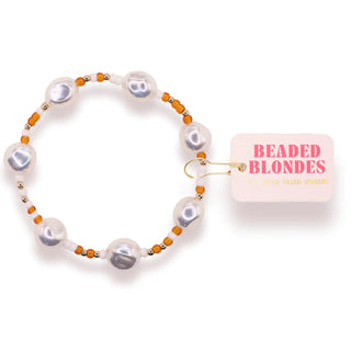Pearl, burnt orange, gold, and white beaded bracelet. 