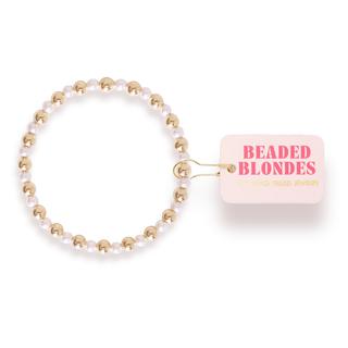 gold and pearl beaded bracelet. 