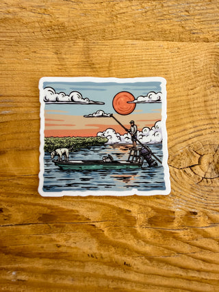 Sticker of a man on a boat with his dog. 