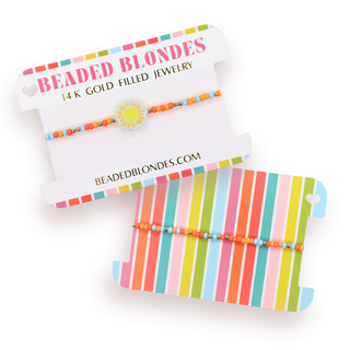 Colorful beaded bracelet with a sun charm that does not dangle. 
