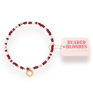maroon, white, and gold beaded bracelet with texas cutout dangle charm. 