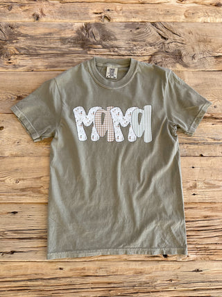 Khaki colored tee with a MAMA text with a mix of ducks, gingham, and stripes print.