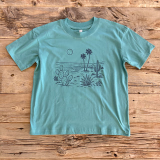 Saltwater colored tee with cactus and palm on the beach scene. 