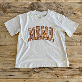 Natural heather t-shirt with MAMA and coastal elements within the MAMA text. 