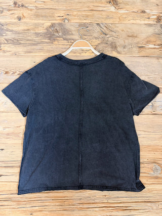 Back of Black V-Neck Top. 