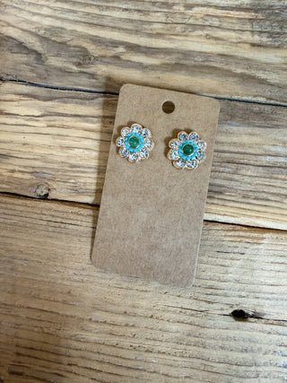 flower shaped stud earring with faux turquoise and diamond accents. 