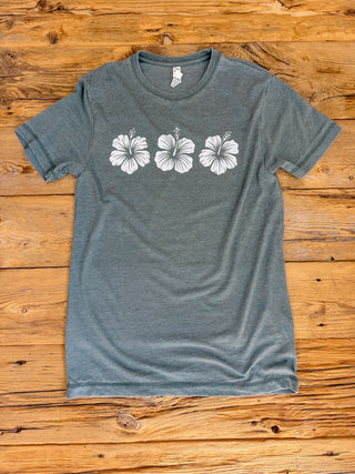 Vintage Washed Green Tee with a hibiscus flowers graphic. 
