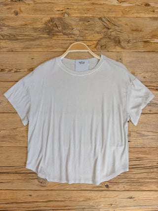 natural colored ribbed short sleeve top. 