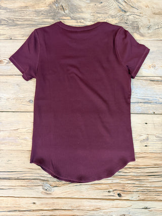 Back of short sleeve burgundy ribbed tee. 