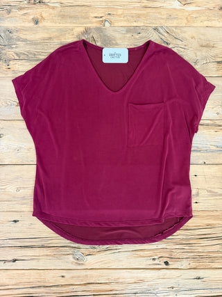Short sleeve burgundy pocket tee. 