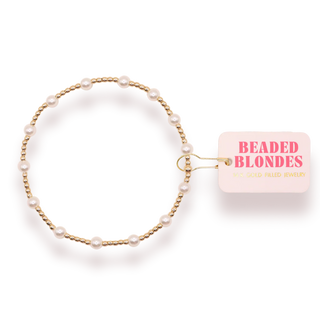 gold and pearl beaded bracelet. 