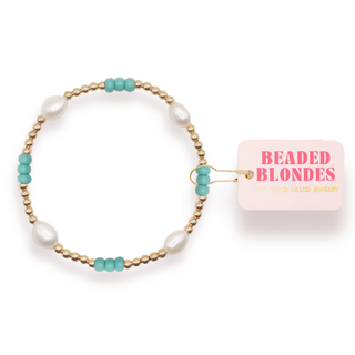 Pearl, turquoise, and gold beaded bracelet. 