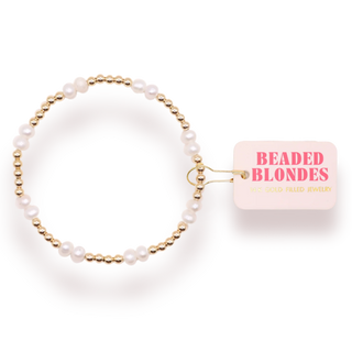 pearl and gold beaded bracelet. 